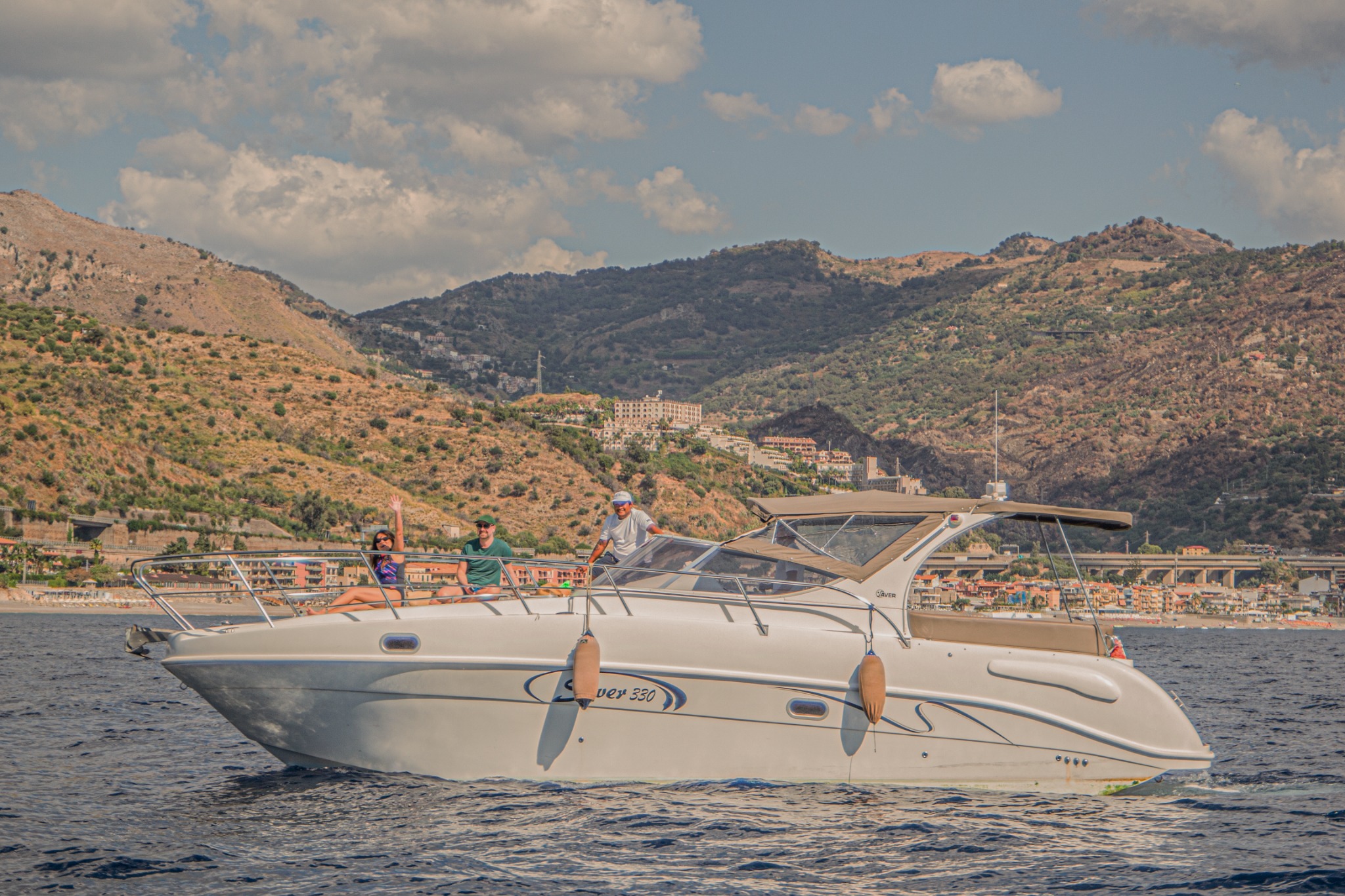 Saver 330 Sport beside the Taormina coast